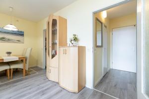 Kuchyň nebo kuchyňský kout v ubytování Probsteier Platz Meeresbrise