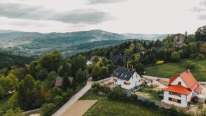 an aerial view of a house in the mountains at Widokówka Kudłacze Dom z Jacuzzi i sauną na wyłączność in Pcim