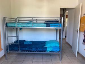 Ένα ή περισσότερα κρεβάτια σε δωμάτιο στο Maison des Grenadiers