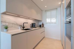 Kuchyň nebo kuchyňský kout v ubytování Hermoso apartamento en Palo Alto