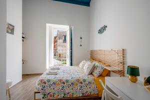 Postel nebo postele na pokoji v ubytování Old Town Vibe