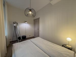 Postel nebo postele na pokoji v ubytování S13 Apartments