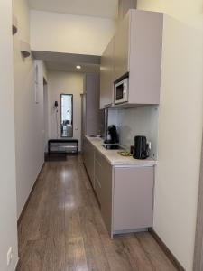 Kuchyň nebo kuchyňský kout v ubytování S13 Apartments