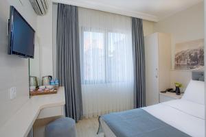 Postel nebo postele na pokoji v ubytování Sim Hotel Istanbul Old City