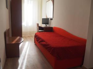 TV a/nebo společenská místnost v ubytování Hotel Roma Assisi
