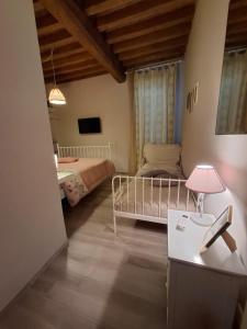Postel nebo postele na pokoji v ubytování Armonie di Campagna Rooms & Breakfast di Valentini Sabina