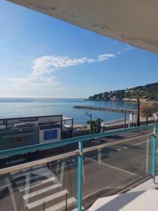 a view of the ocean from a building at Atelier Sonia in Roquebrune-Cap-Martin