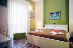 Postel nebo postele na pokoji v ubytování Affittacamere b&b meapvlia + 11 fotografií