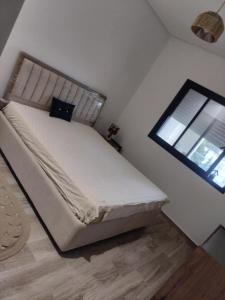 Postel nebo postele na pokoji v ubytování Monastir