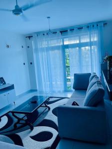 Χώρος καθιστικού στο Tausi Luxury Apartments,Nyali