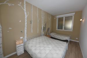 Postel nebo postele na pokoji v ubytování Appartamenti Fossato