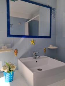 Koupelna v ubytování Appartamento Sul Mare + 16 fotografií