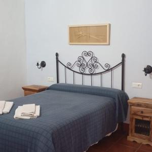 Postel nebo postele na pokoji v ubytování Casas Rurales Cortijo la Cañada + 37 fotografií