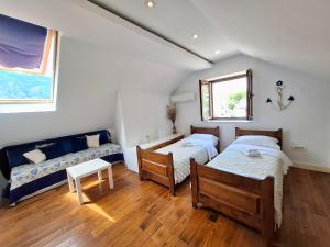 Filip Deluxe Rooms客房内的一张或多张床位