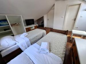 Filip Deluxe Rooms客房内的一张或多张床位