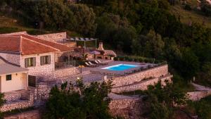 an aerial view of a house with a swimming pool at Villa Aurora in Athani
