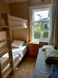 Postel nebo postele na pokoji v ubytování Loksa laagripaik + 32 fotografií