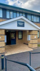 a building with a sign that reads the secret tower at Spacious 2 Bedroom Flat City Centre in Cannock