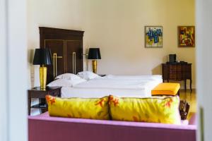 Postel nebo postele na pokoji v ubytování Relais & Châteaux Bülow Palais