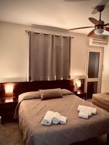Postel nebo postele na pokoji v ubytování Freya Rooms