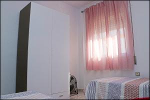Posteľ alebo postele v izbe v ubytovaní Apartamento luminoso en el centro