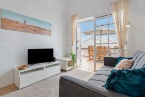 TV a/nebo společenská místnost v ubytování Calida Vivienda Accesible