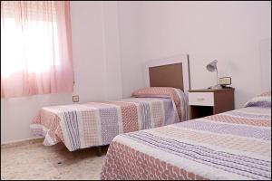 Posteľ alebo postele v izbe v ubytovaní Apartamento luminoso en el centro + 11 fotografií
