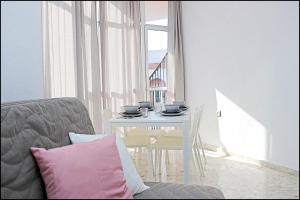 Posedenie v ubytovaní Apartamento luminoso en el centro