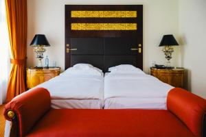 Postel nebo postele na pokoji v ubytování Relais & Châteaux Bülow Palais