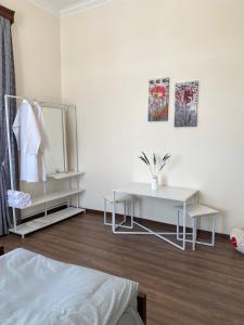 Postel nebo postele na pokoji v ubytování Yan Guest House