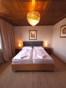 Postel nebo postele na pokoji v ubytování Guesthouse Purbach