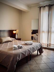 Postel nebo postele na pokoji v ubytování Freya Rooms + 37 fotografií