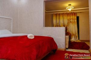 Postel nebo postele na pokoji v ubytování Paradise Point Resort Nyahururu