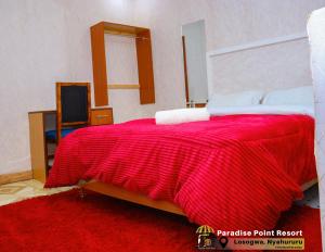 Postel nebo postele na pokoji v ubytování Paradise Point Resort Nyahururu