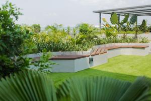 a view of a garden with plants at Accra Luxury Apartments at Loxwood in Accra
