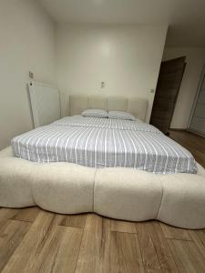 Postel nebo postele na pokoji v ubytování Duplex Apartment + 7 fotografií