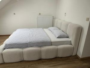 Postel nebo postele na pokoji v ubytování Duplex Apartment