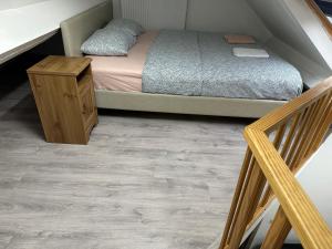 Postel nebo postele na pokoji v ubytování Duplex Apartment