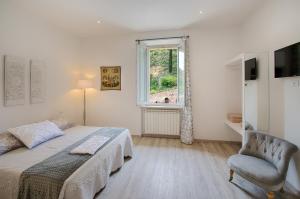 Posteľ alebo postele v izbe v ubytovaní Siena Vip B&B