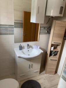 Koupelna v ubytování Apartments Vasilić