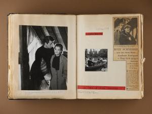 a book with two photographs of a man and a woman at Le Moulin d'Andé in Andé