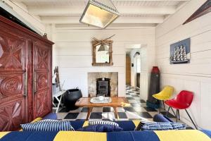 Posezení v ubytování Exceptionnelle maisonnette - Les pieds dans l’eau