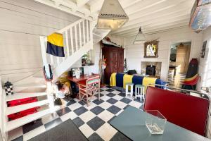 Posezení v ubytování Exceptionnelle maisonnette - Les pieds dans l’eau