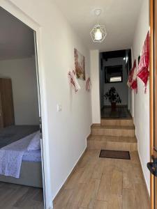 Postel nebo postele na pokoji v ubytování Vila Zefi