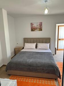 Postel nebo postele na pokoji v ubytování Vila Zefi