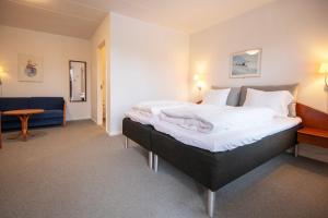 Voodi või voodid majutusasutuse Hotel Korning toas