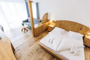 Posteľ alebo postele v izbe v ubytovaní Hotel Tenz