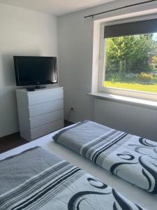 Postel nebo postele na pokoji v ubytování Ninas Ferienwohnung
