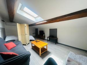 Posezení v ubytování Grand studio proche centre