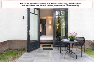 Patio nebo venkovní prostory v ubytování Hof Molenerve - gastenkamers en vakantiewoning
